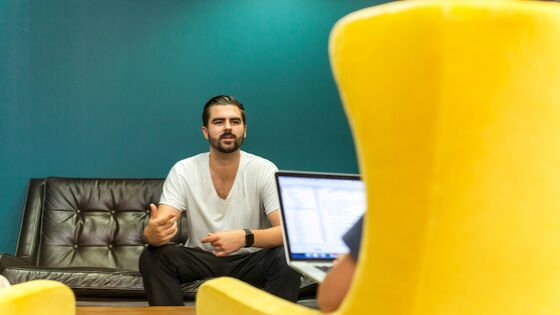 Image of employees talking - demonstrating the importance of employee engagement strategies